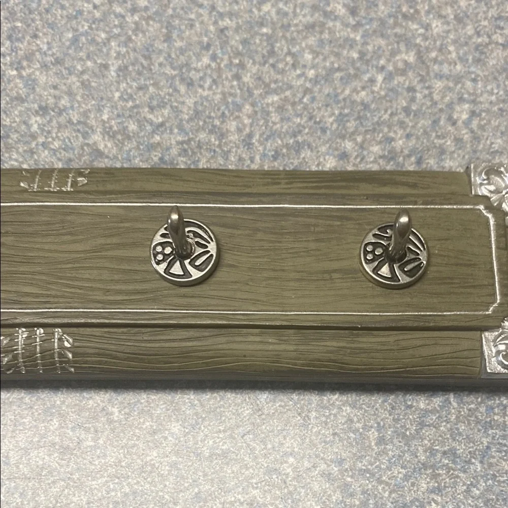 Antique Green and Silver Wall Hooks with Decorative Accents